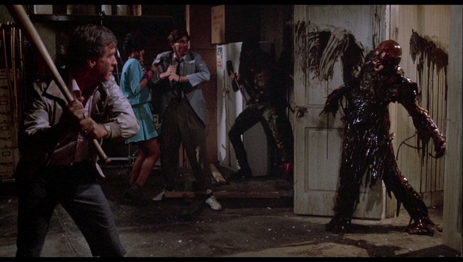 Tarman confronting Clu Gulager's character in Return of the Living Dead