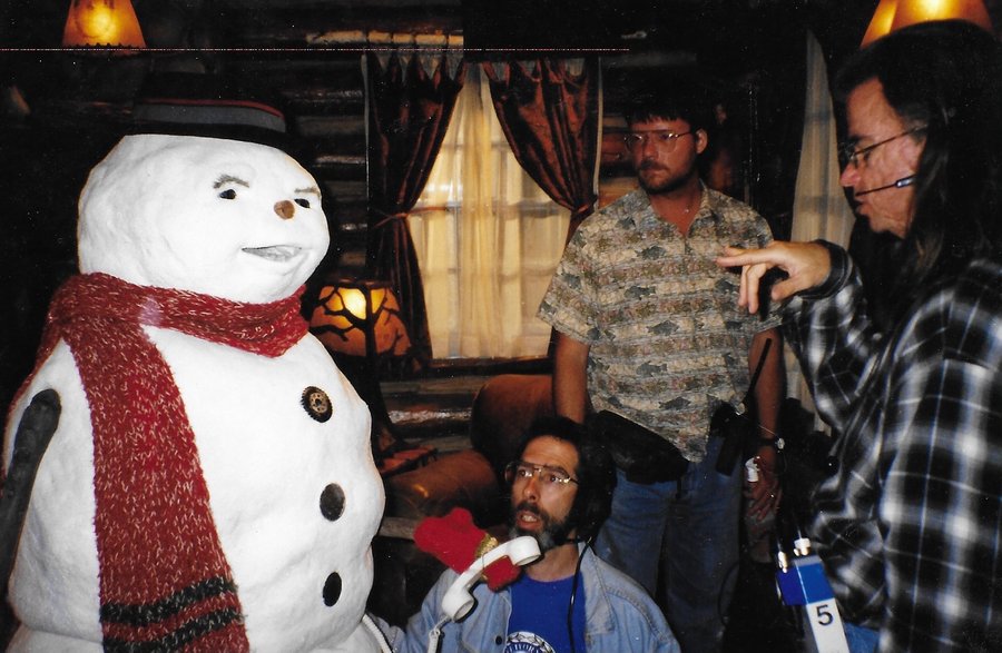The Jack Frost puppeteer team at work with the snowman puppet